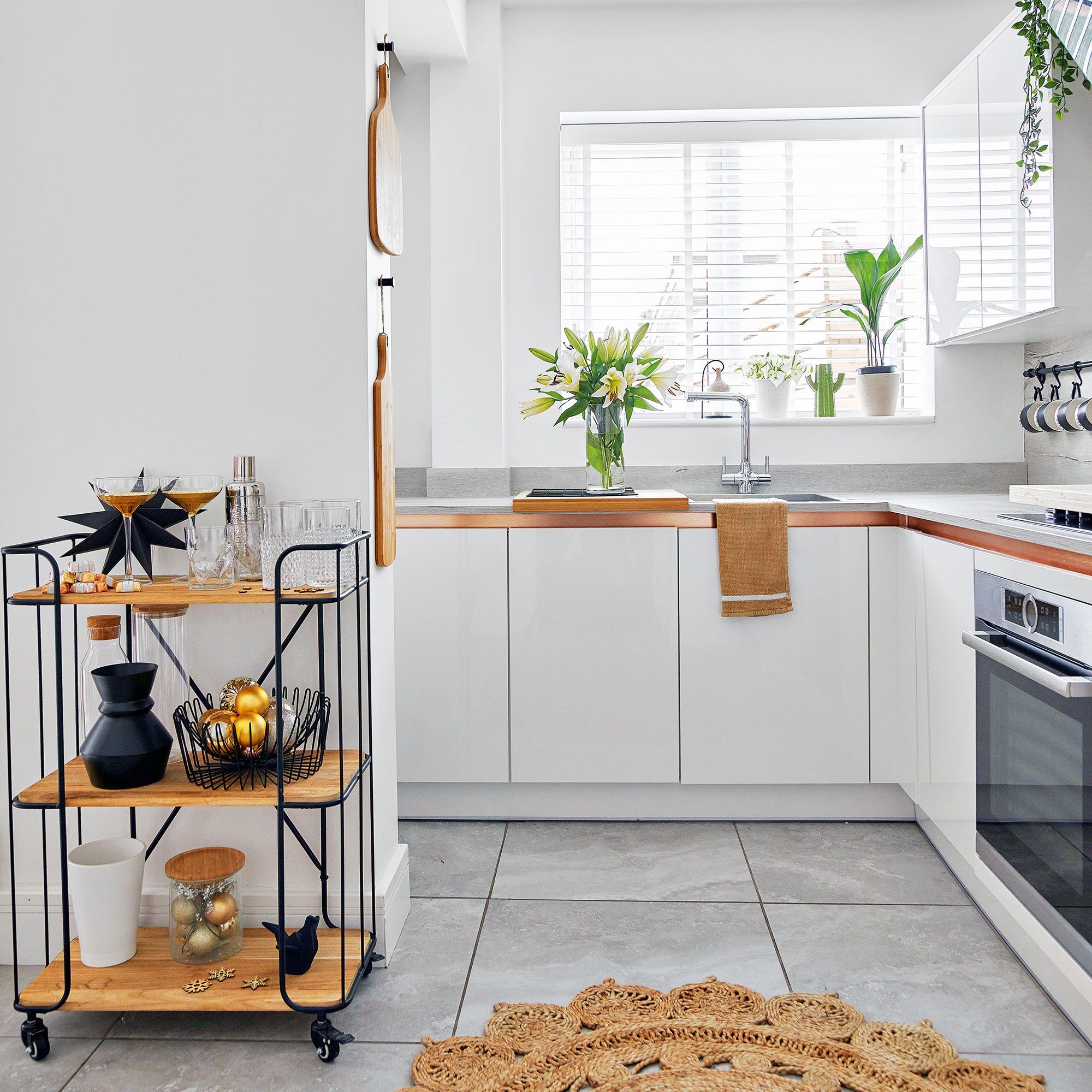 Kitchen with white wall and white cabinet