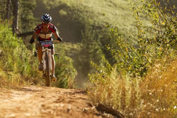 Kevin Evans of Team 360 Life climbs up to Fisantboskloof just before breaking his collarbone during stage 1 of the 2011 Absa Cape Epic Mountain Bike stage race held from Saronsberg Wine Estate in Tulbagh, South Africa on the 28 March 2011