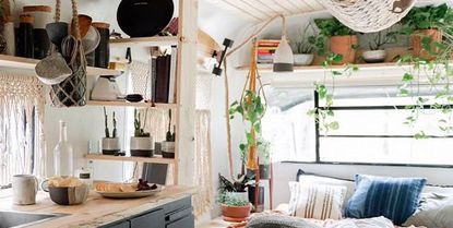 Tiny home with shelving storage and macrame 