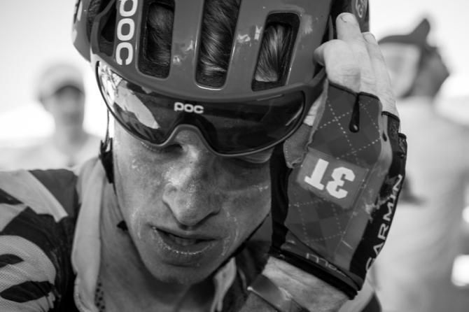 Ben King (Garmin) cools down on top of the climb