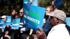 Rideshare workers in Boston protest for greater flexibility in 2023. 