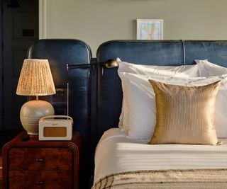 Blue headboard, lamp