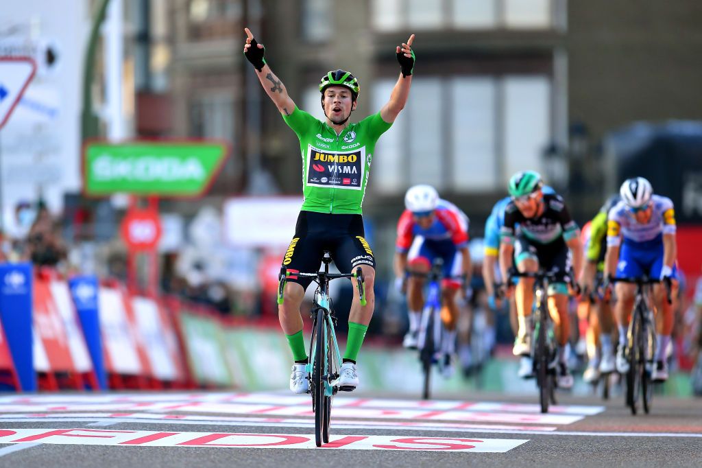 SUANCES SPAIN OCTOBER 30 Arrival Primoz Roglic of Slovenia and Team Jumbo Visma Green Points Jersey Celebration Andrea Bagioli of Italy and Team Deceuninck QuickStep Felix Grobschartner of Austria and Team BORA Hansgrohe during the 75th Tour of Spain 2020 Stage 10 a 185km stage from Castro Urdiales to Suances lavuelta LaVuelta20 La Vuelta on October 30 2020 in Suances Spain Photo by Justin SetterfieldGetty Images