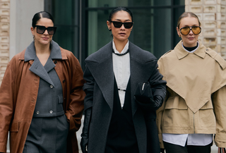 Photo of three women wearing Scandi winter outfit and street style looks during Copenhagen Fashion Week Fall-Winter 2025.