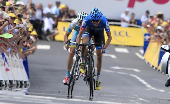 Daniel Martin (Garmin-Sharp) was first through the final corner and held his lead through to the finish line for a hard-fought Tour de France stage victory