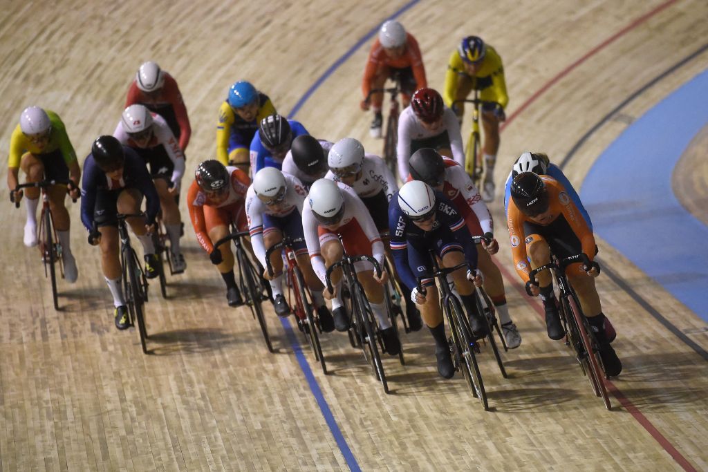 Riders compete in the womens Scratch Race during the UCI Track Cycling World Championships at JeanStablinski velodrome in Roubaix northern France on October 20 2021 Photo by FRANCOIS LO PRESTI AFP Photo by FRANCOIS LO PRESTIAFP via Getty Images