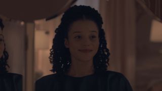 Agnes smiling in the mirror ahead of The Ball