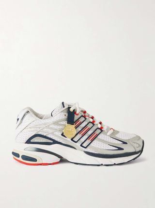 + Sportliche und reichhaltige Olympic Adistar-Sneaker, verziert mit Kunstleder und gummibeschichtetem Mesh