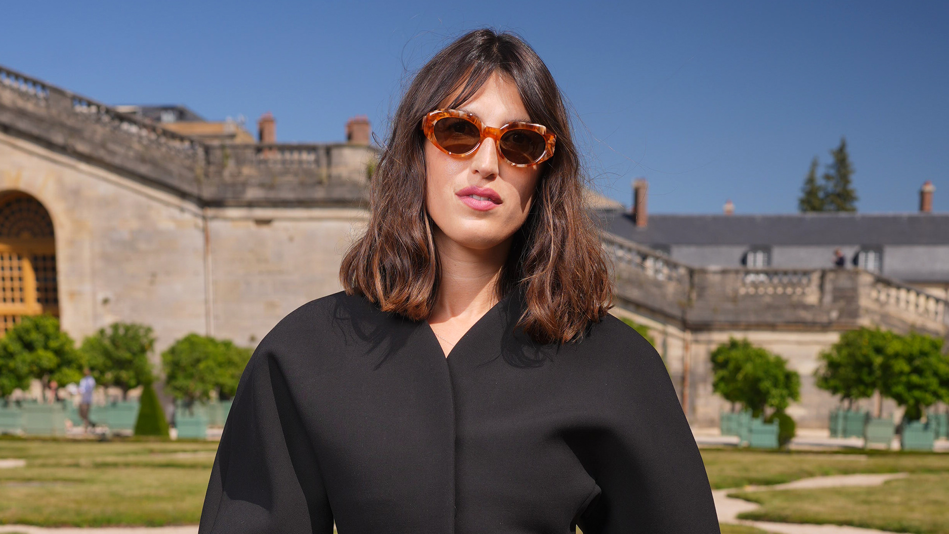 Jeanne Damas wearing a black blazer in Paris