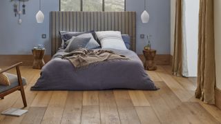 pale engineered wooden floor in bedroom