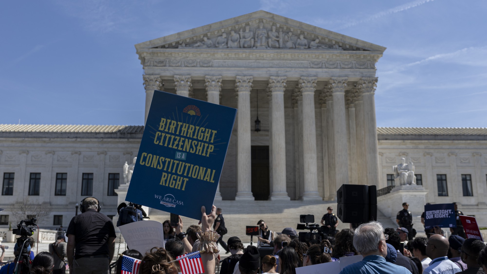 Protesters at the Supreme Court ahead of oral arguments on birthright citizenship.