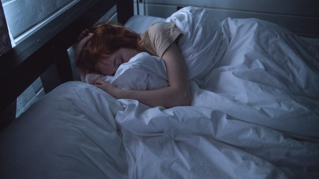 Woman sleeping in bed