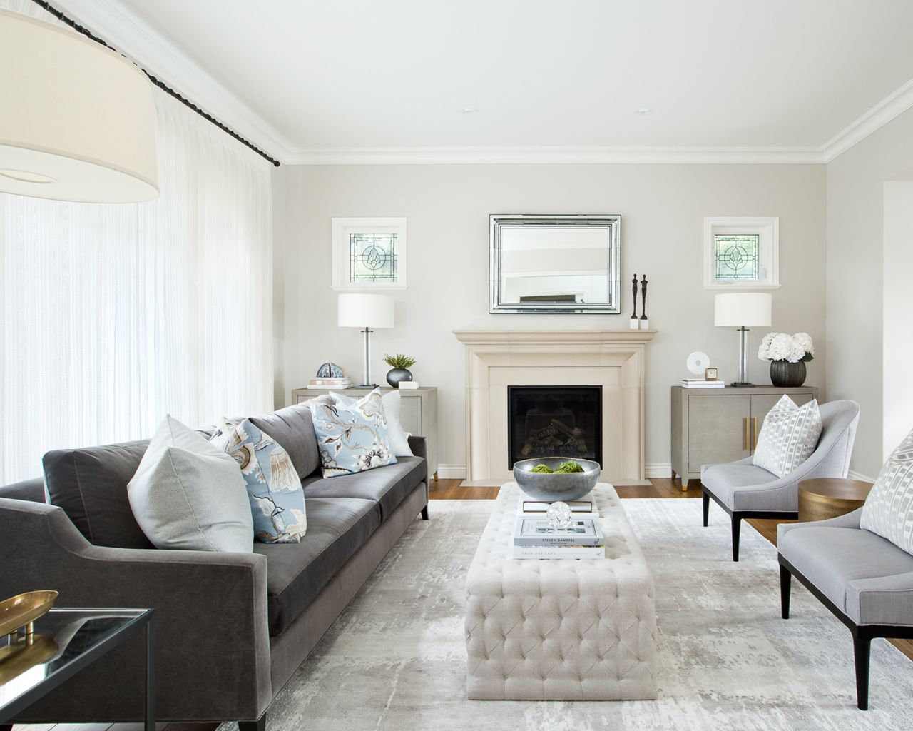 Large window curtain ideas with light white curtains in a neutral living room