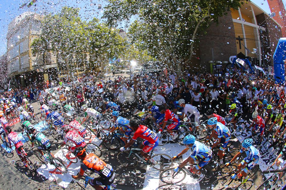 Confetti flies for the start of stage 1 in San Juan
