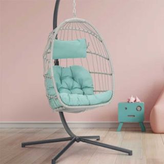 Porch swing hanging chair with blue cushions
