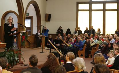 Vicki Cowart, head of Planned Parenthood Rocky Mountains, speaks at a vigil after the Colorado Springs, Colorado, shooting