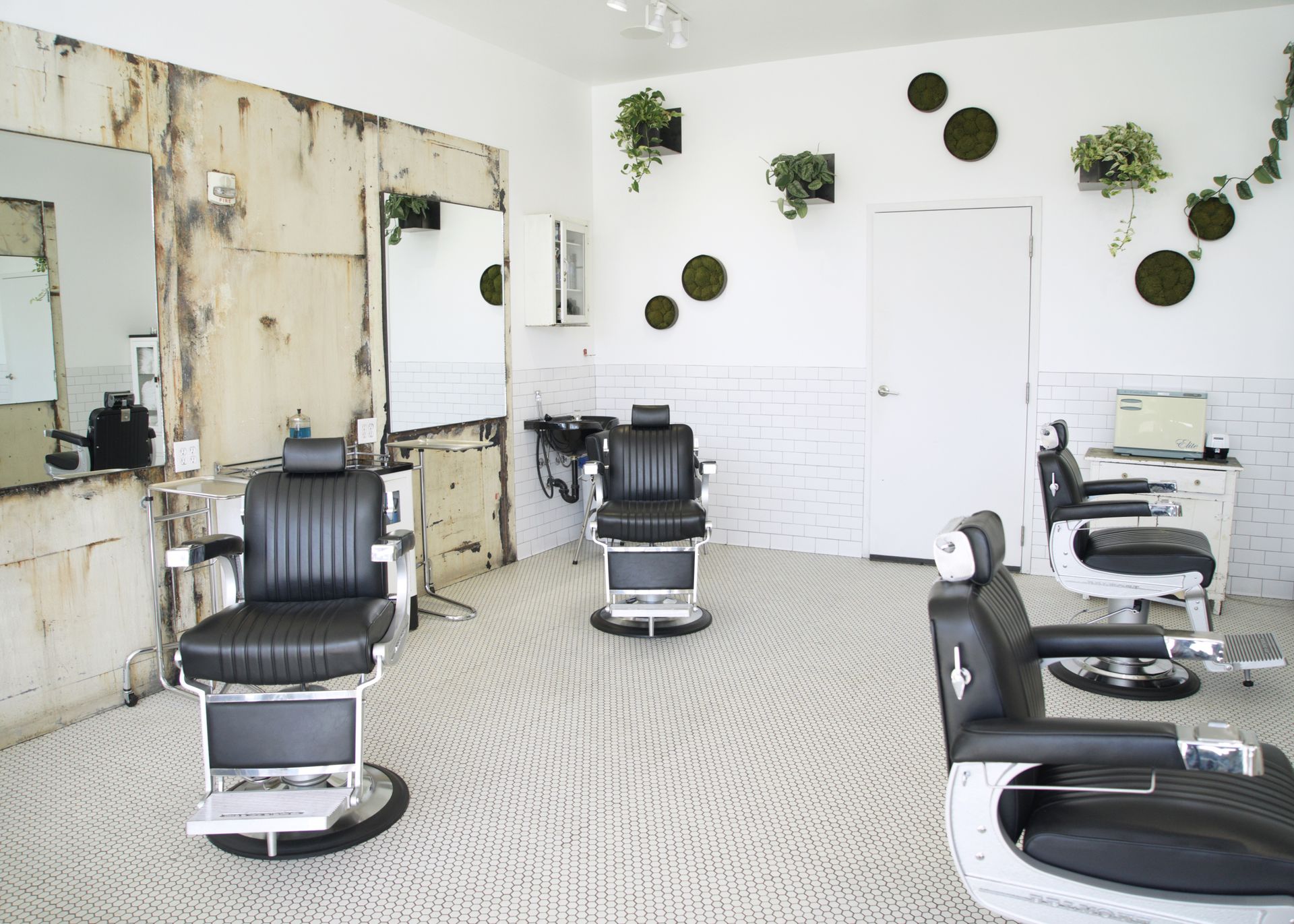 Interior of Blind Barber shop in Culver City with vintage barber chairs