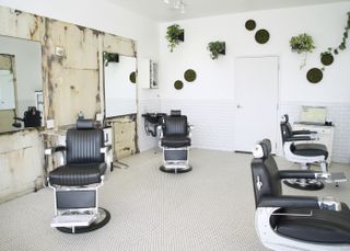 Interior of Blind Barber shop in Culver City with vintage barber chairs