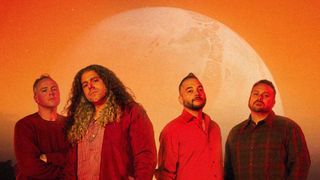 Coheed and Cambria standing in front of the Moon
