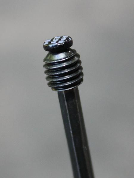 Details, details: as do many other manufacturers, TRP uses small set screws to secure the straddle cable but in this case, special knurled heads provide more purchase than usual and are slightly gentler on the cable, too
