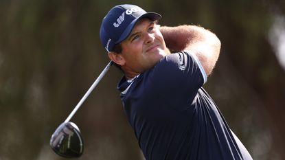 Patrick Reed takes a shot at the 2023 Dubai Desert Classic