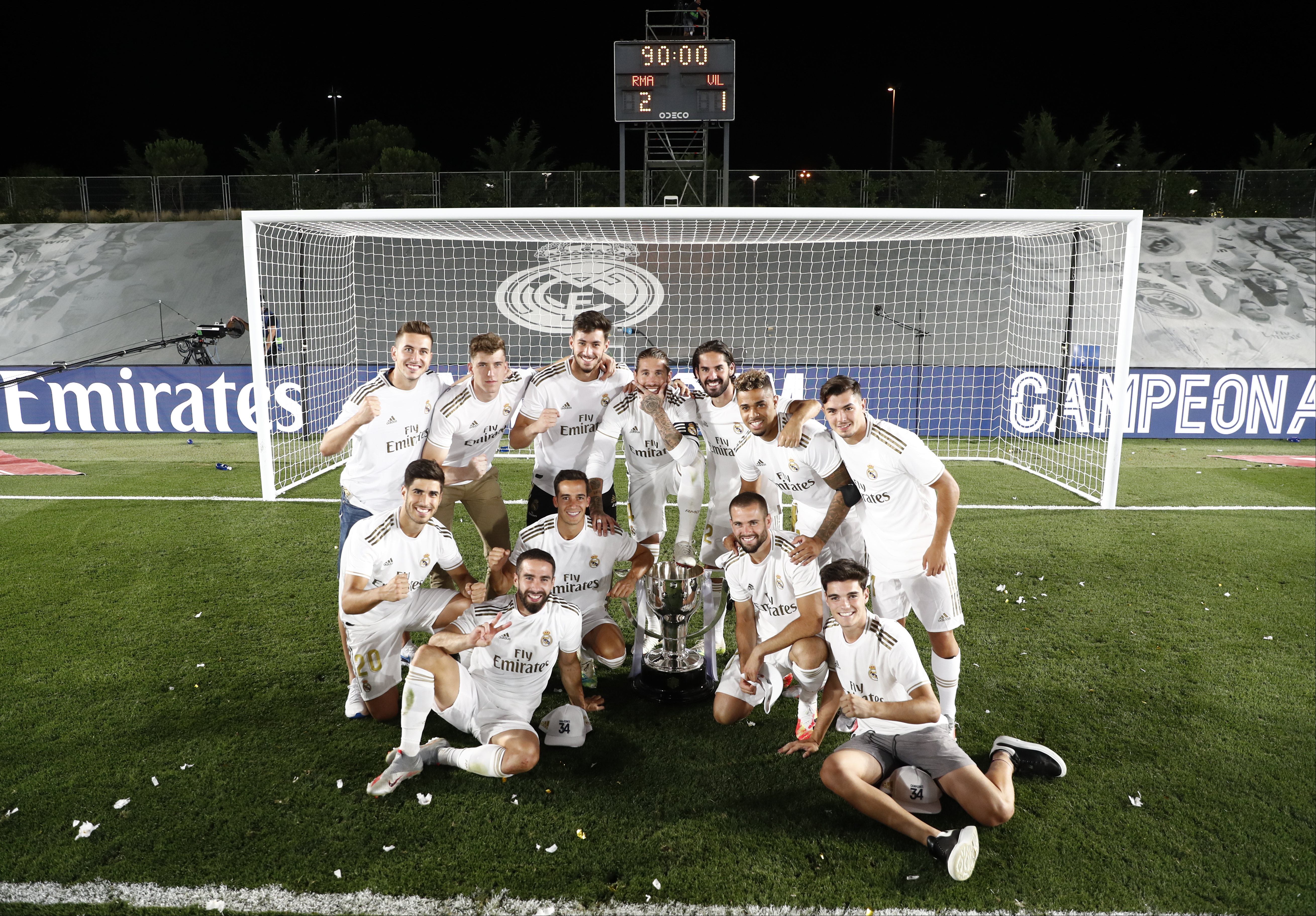 Real Madrid players celebrate their La Liga title win after a game against Villarreal in July 2020.