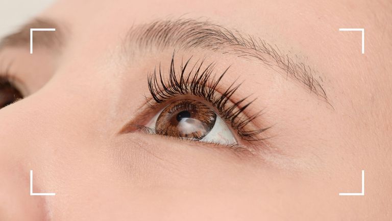 woman without makeup with long, natural lashes