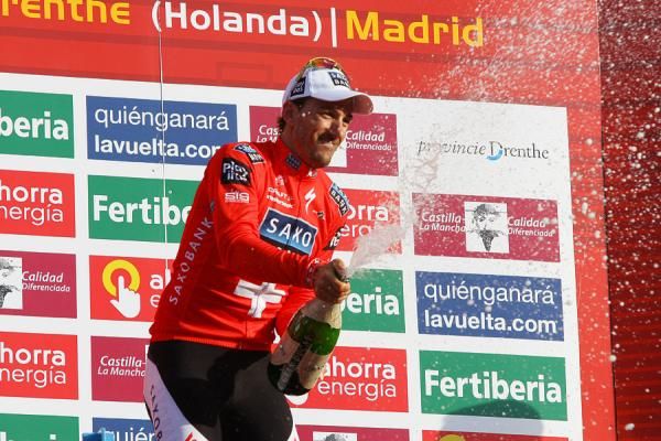 Fabian Cancellara pops the cork on a successful day.