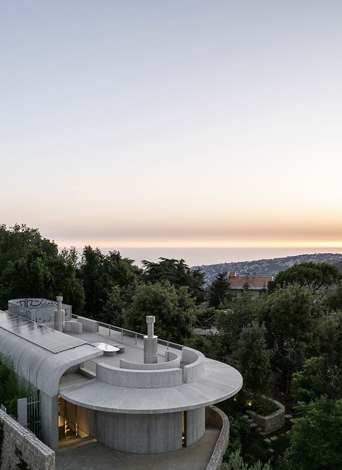 Capsule Retreat by East Architecture Studio, a concrete house in the leafy countryside with tall ceilings and minimalist interiors