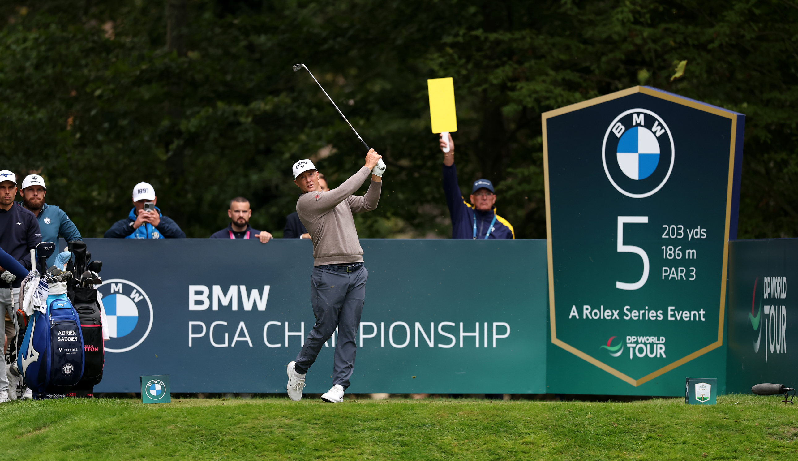 Alex Noren hits an iron shot at the fifth hole