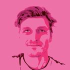 Jacob Ridley headshot in pink