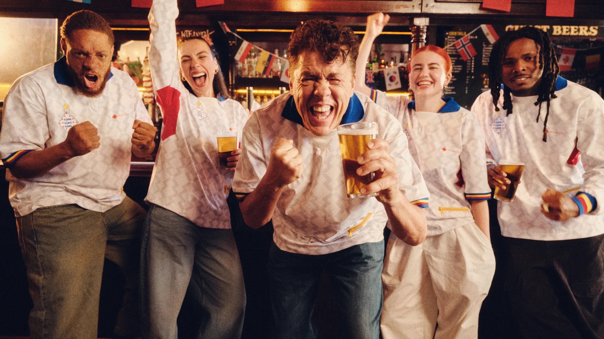 Lidl football shirt being worn by people in a bar 