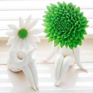 ceramic sculptures with white and green coloured