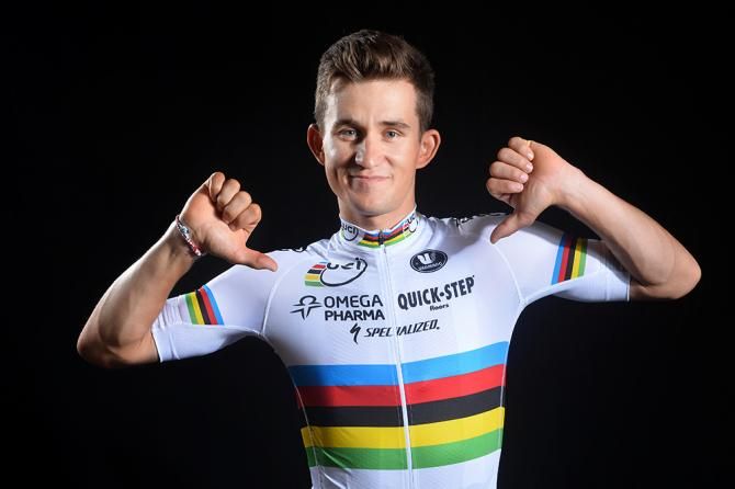 Michal Kwiatkowski shows off his new rainbow stripes