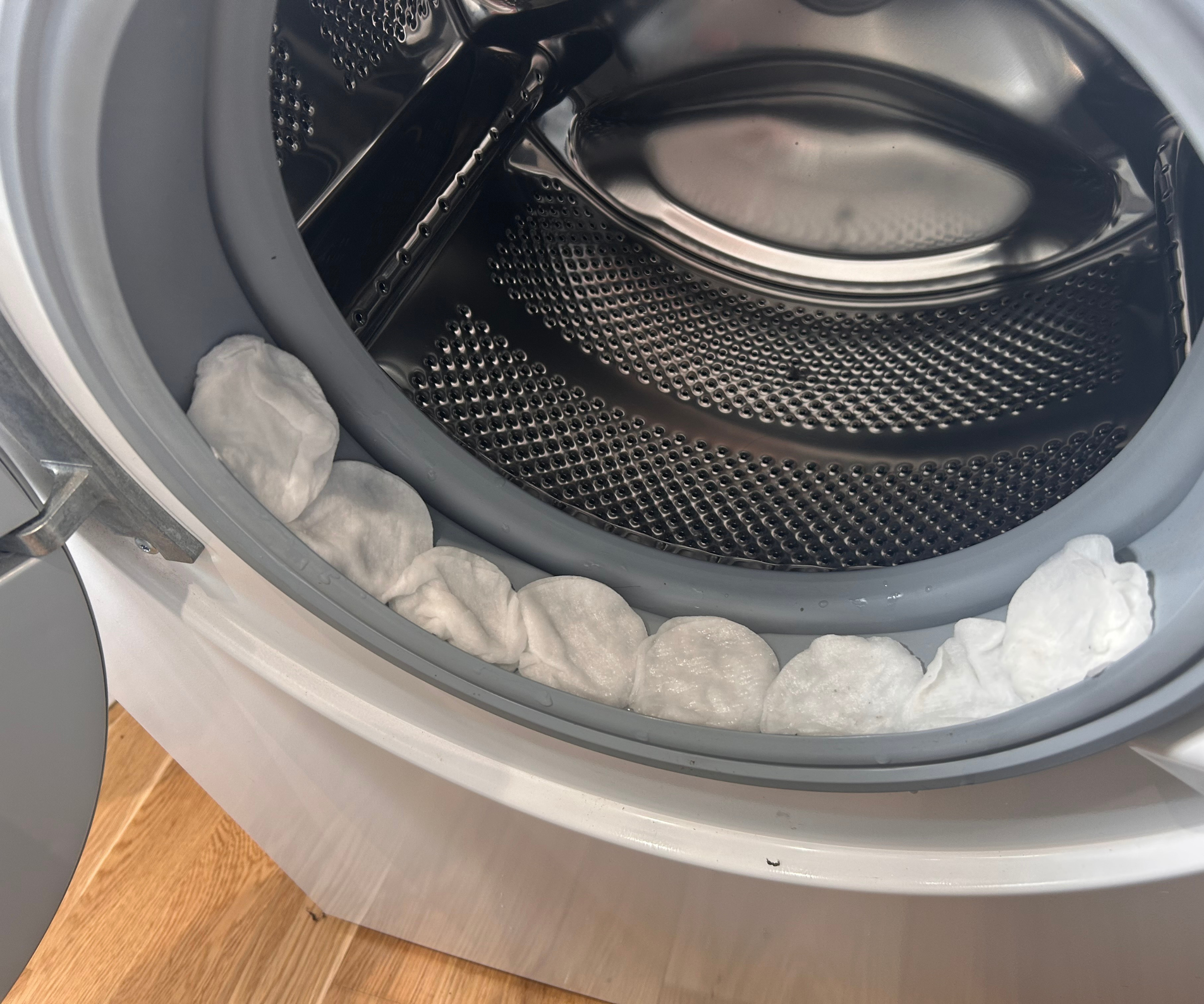 Cotton pads inside the rubber of Megan's washing machine