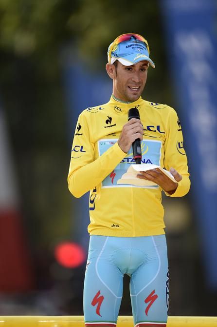 Vincenzo Nibali (Astana) gives a thoughtful thank you speech on the final podium in Paris