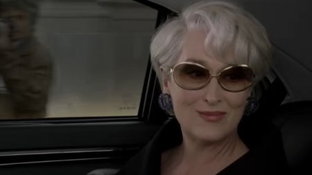 Miranda smiling in sunglasses in The Devil Wears Prada