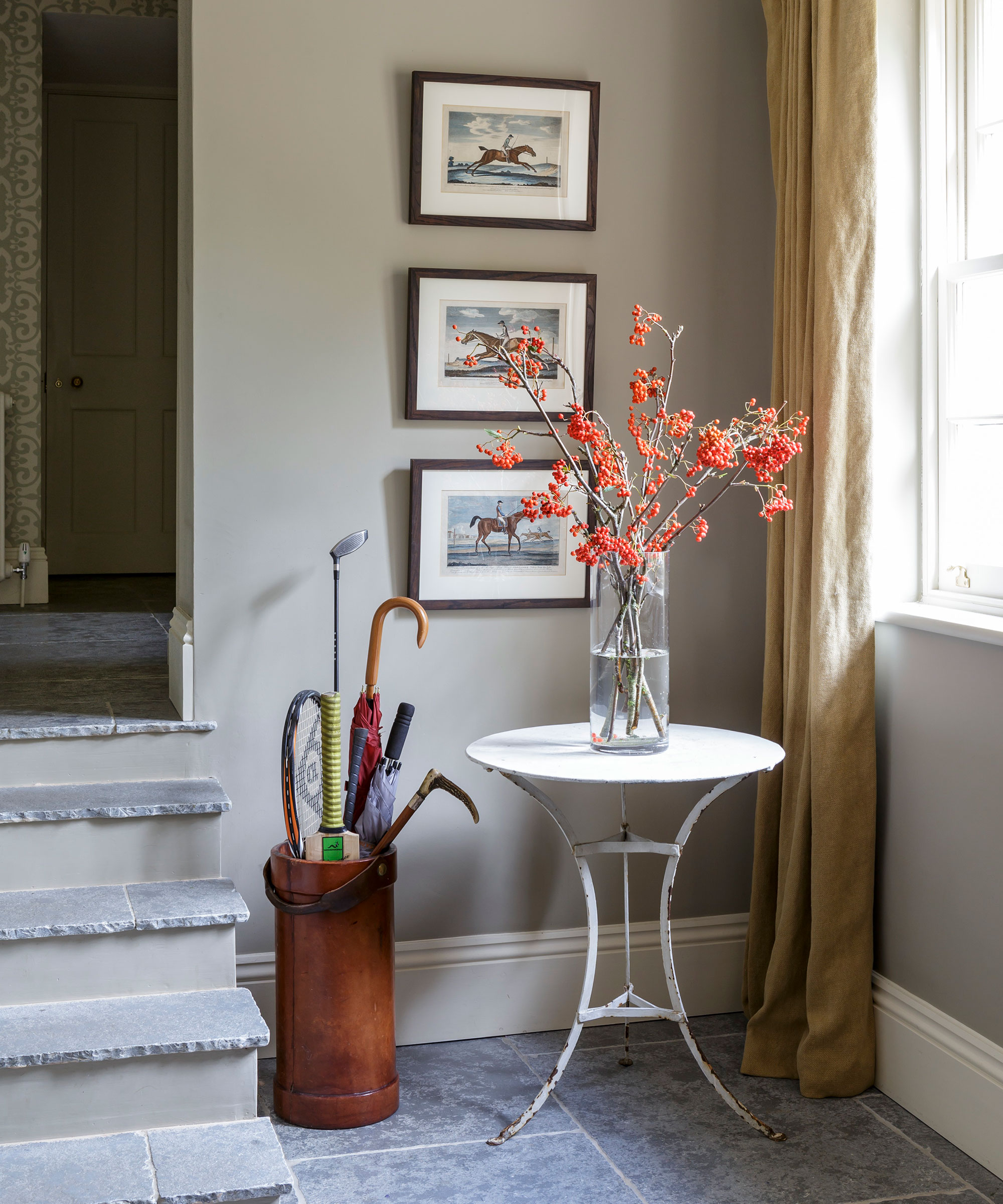 Hallway paint ideas with neutral wall and grey stone floor