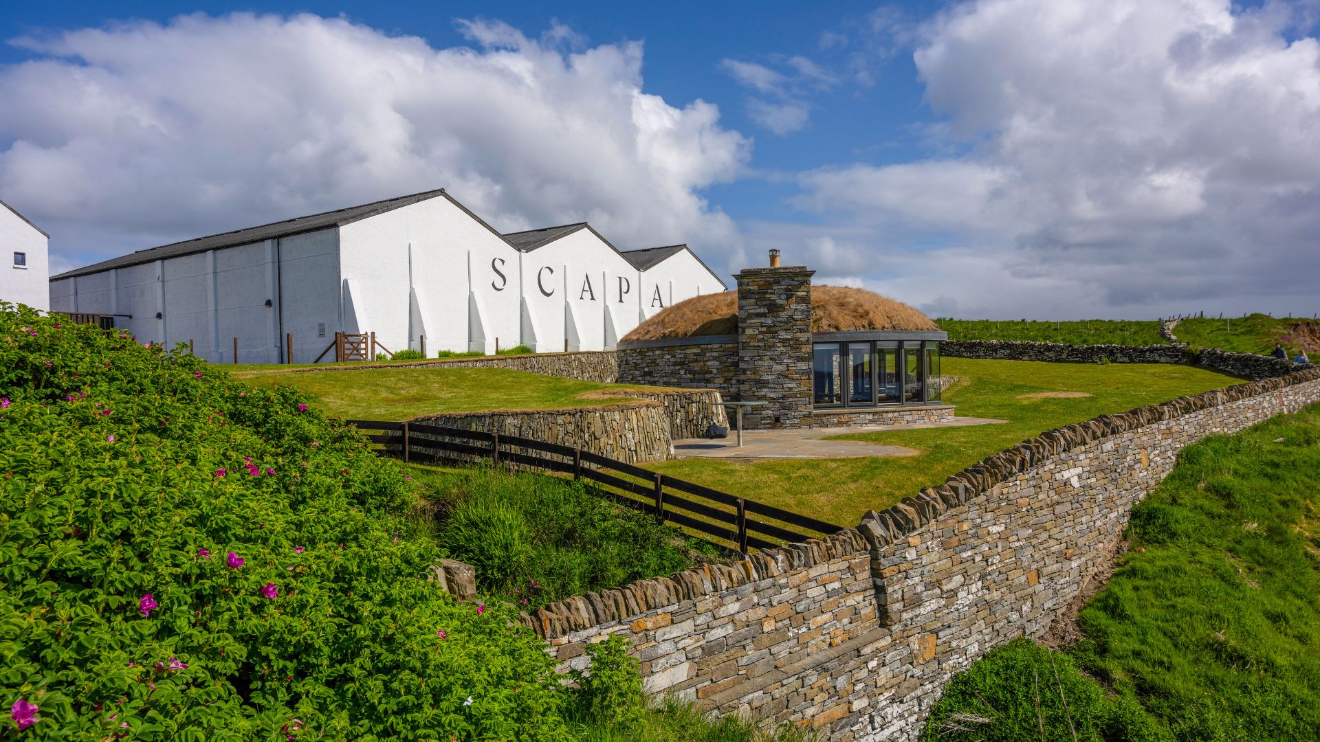 an image of the Scapa distillery exterior and their tasting room which are on a hill on the Orkney Islands in Kirkwall