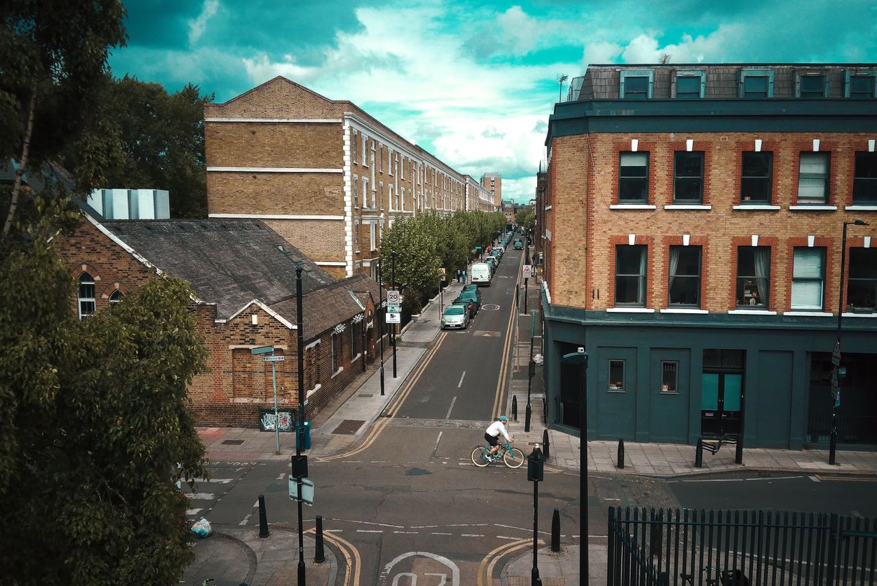 Photograph taken with the RewindPix digital compact showing view of a road from above with an artificially cool-toned sky