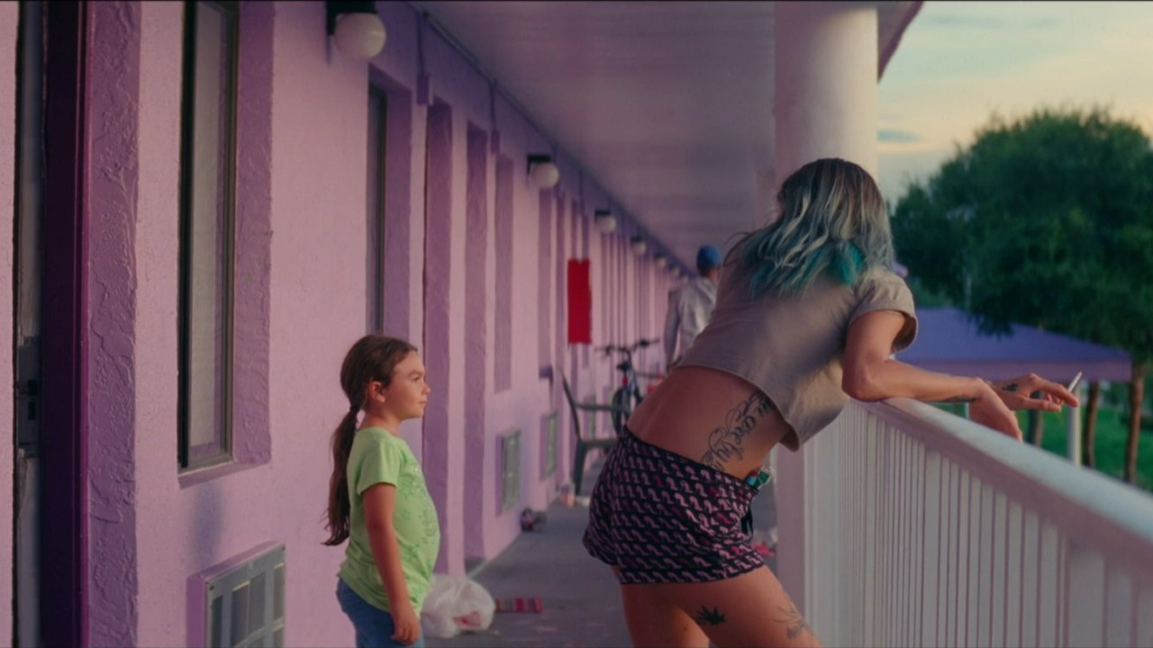 Bria Vinaite looking at Brooklynn Prince in The Florida Project.