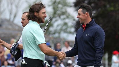 Tommy Fleetwood and Rory McIlroy shake hands during the Dubai Duty Free Irish Open