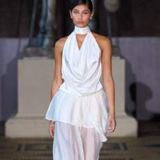 Photo of model at The Garment Spring Summer 2027 show wearing a white dress during Copenhagen Fashion Week Spring Summer 2027.