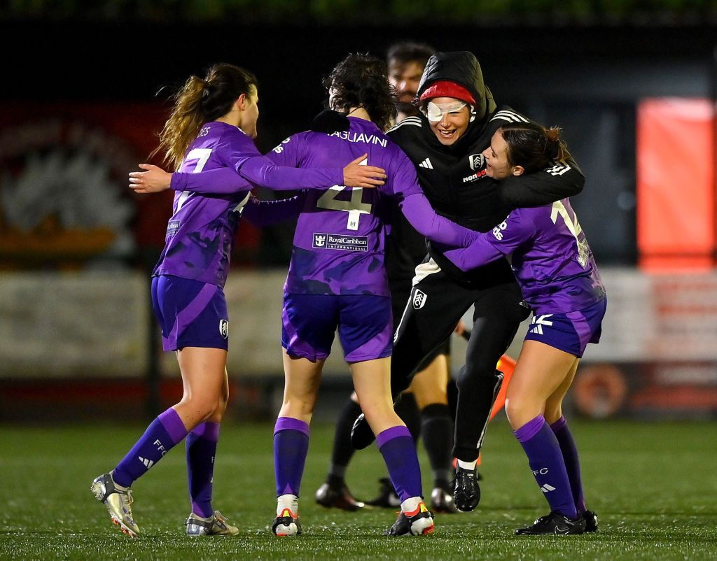 Megalie Mendes and Ella Tagliavini of Fulham celebrates following the team&#039;s victory in The Adobe Women&#039;s FA Cup Third Round match between Brentford and Fulham at Bedfont Sports Club on December 08, 2024 in Bedfont, England.