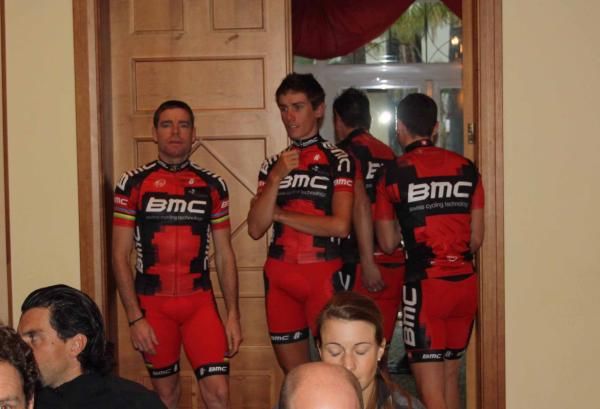Cadel Evans and Tim Roe wait to be introduced at the BMC presentation.