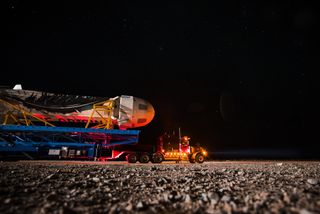 Blue Origin engineers roll the company's New Shepard spacecraft and rocket to the launch pad at the firm's West Texas proving grounds for an unmanned suborbital test flight on Nov. 23, 2015.