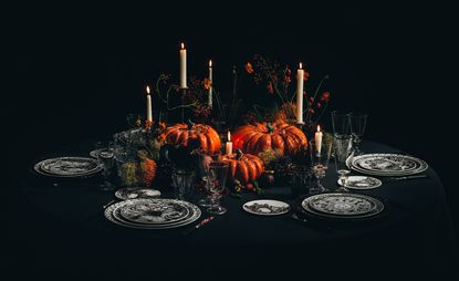 Dior Halloween black and white table setting with ceramic pumpkins