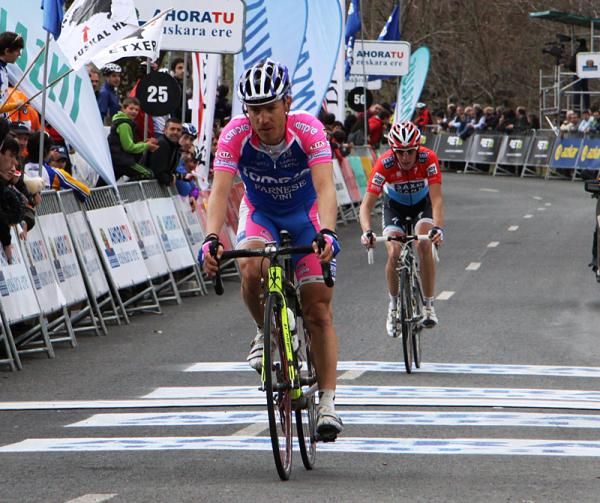 Damiano Cunego (Lampre-Farnese Vini) rides across the line in seventh ahead of Andy Schleck (Saxo Bank)