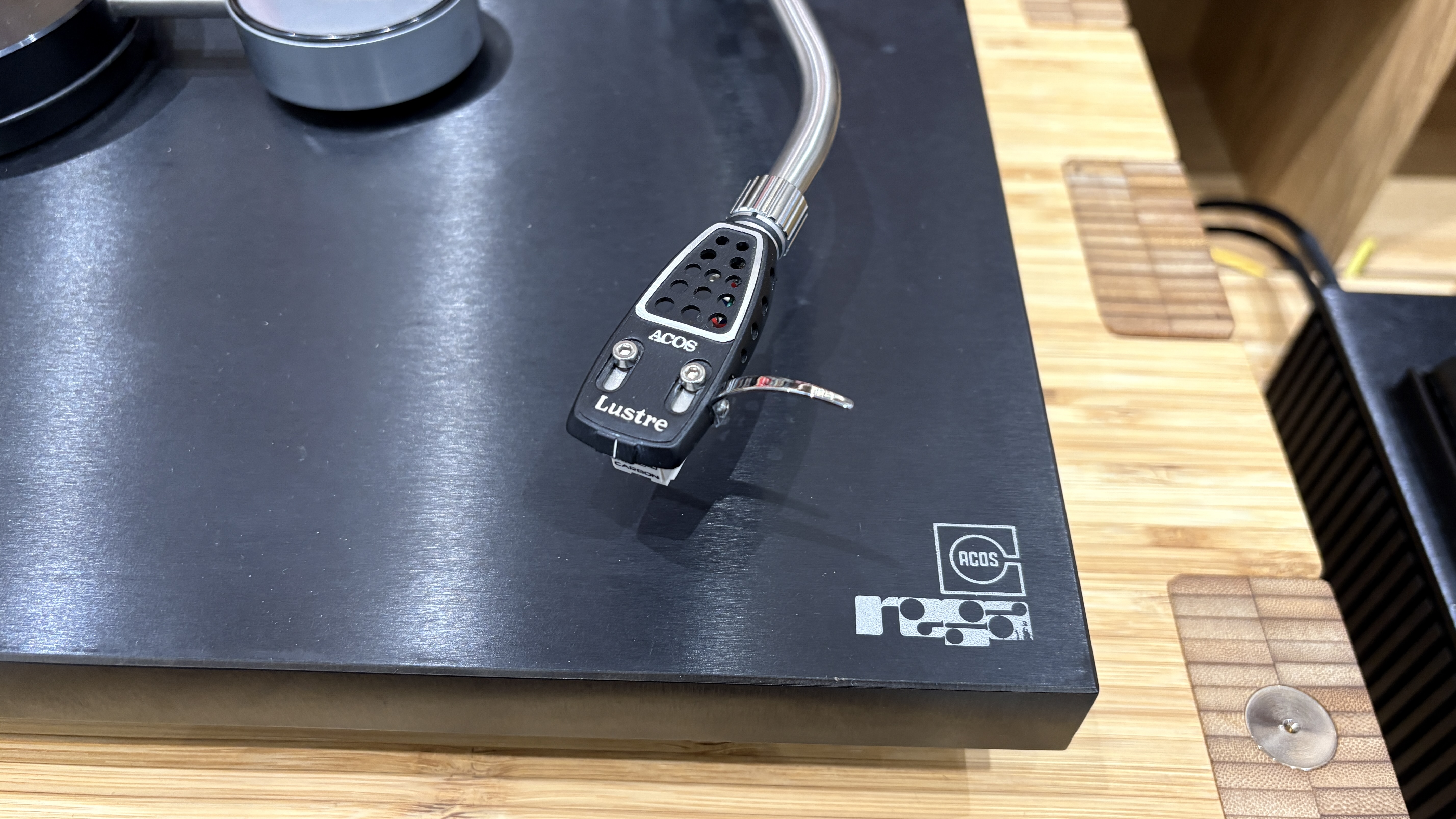 Original Rega Planet turntable with Acos Lustre tonearm on wooden hi-fi rack