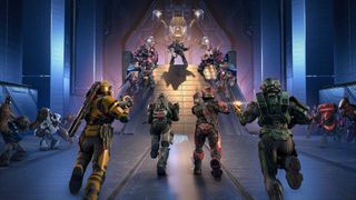 Screenshot from Halo Infinite's Firefight: Gauntlet mode, showing four spartans sprinting toward a group of armored brutes inside a shiny, alien interior.